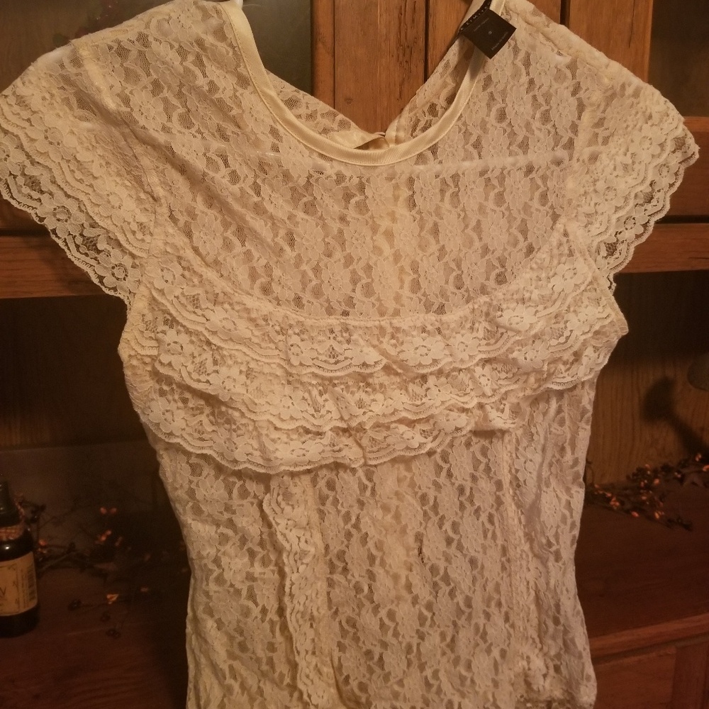 Lace button back beautiful top by the limited sm